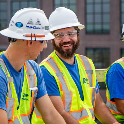 workers smiling and talking